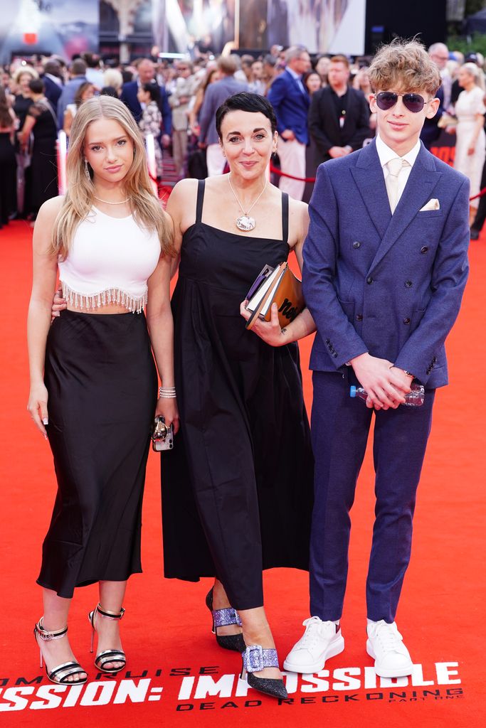 (L to R) Grace Freeman, Amanda Abbington and Joe Freeman arrive at the UK premiere of Mission: Impossible - Dead Reckoning Part One at Odeon Leicester Square in London.