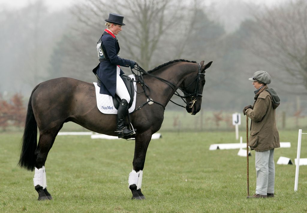 Zara Phillips (riding her horse Tallyho Sambucca) talks with her mother Princess Anne, The Princess Royal as she competes on day 2 of the Gatcombe Park Horse Trials on March 27, 2011 in Stroud, England
