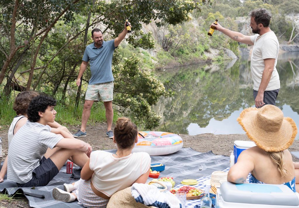 Heat cast enjoy family picnic by the lake
