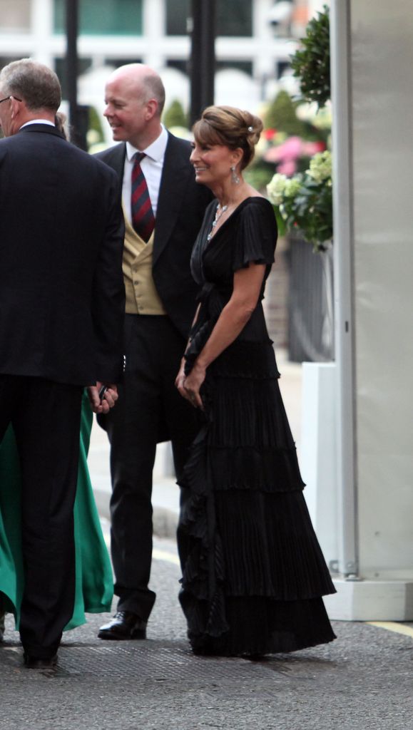 Carole Middleton in a black tiered gown with her hair up