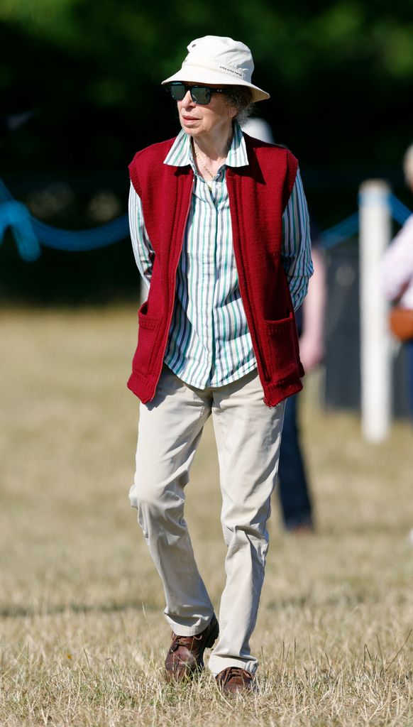 Princess Anne, Princess Royal watches daughter Zara Tindall warm up before competing in the dressage phase of the 2022 Festival of British Eventing at Gatcombe Park on August 6, 2022 in Stroud, England.