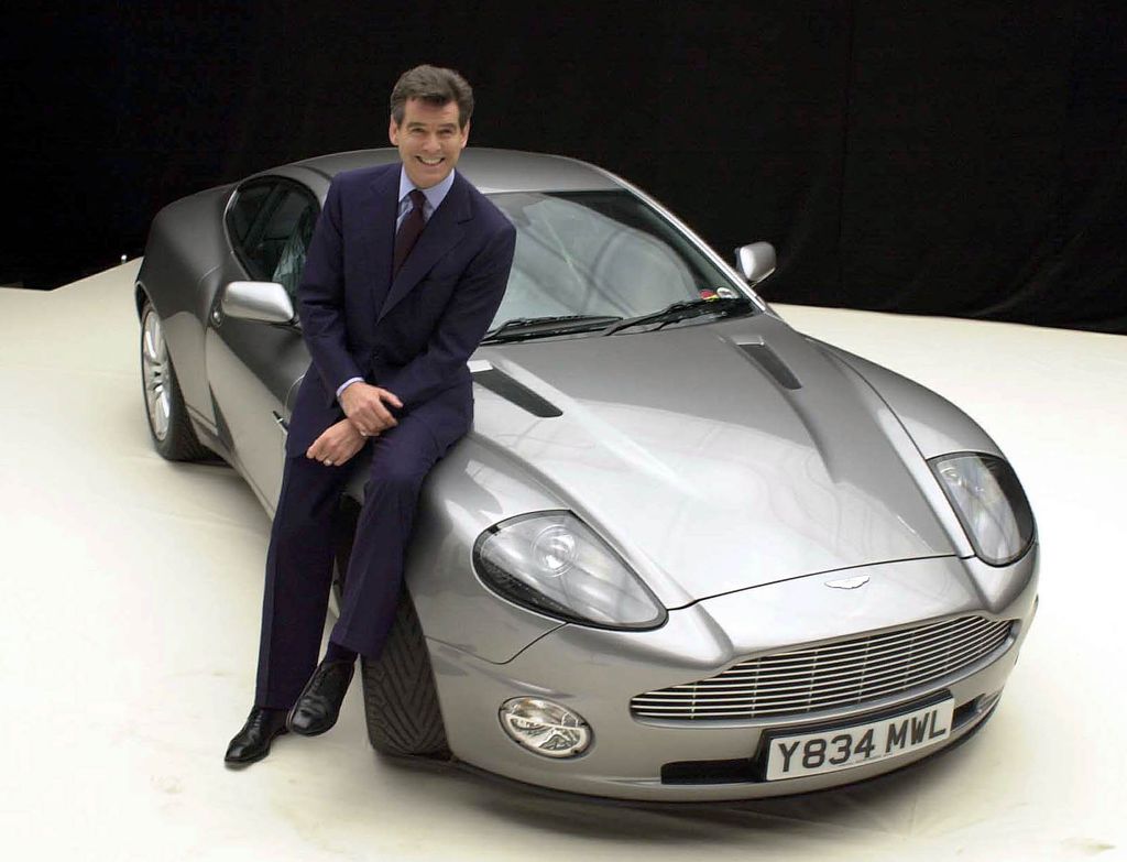 James Bond actor Pierce Brosnan with the Aston Martin Vanquish during a photocall for 'Bond 20', the working title for the latest film which starts production on the at Pinewood Studios in Iver, Bucks.     * 19/11/02: A group of convalescing Bond fans was today being treated to a sneak preview of the latest 007 adventure. Patients at St Thomas  Hospital in London were watching the new action film Die Another Day at a special screening at the UK s only hospital cinema. The showing of the new movie, which goes on general release on Wednesday, was the first preview to be held at MediCinema at the hospital.