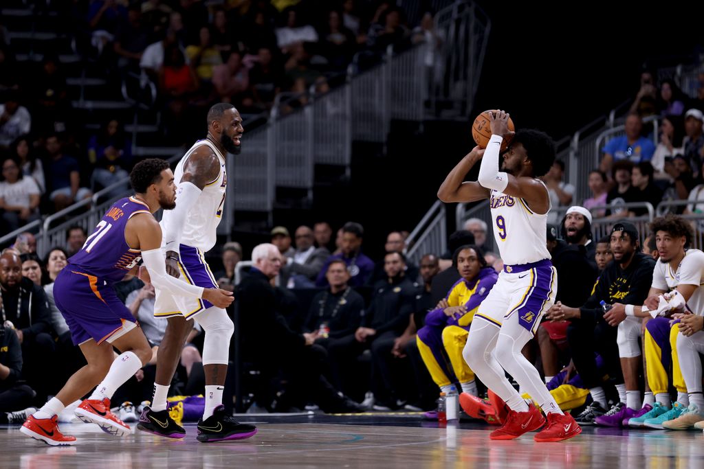 lebron james and bronny james playing together with the lakers