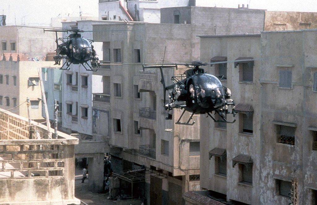 Two Black Hawk helicopters flying in Black Hawk Down