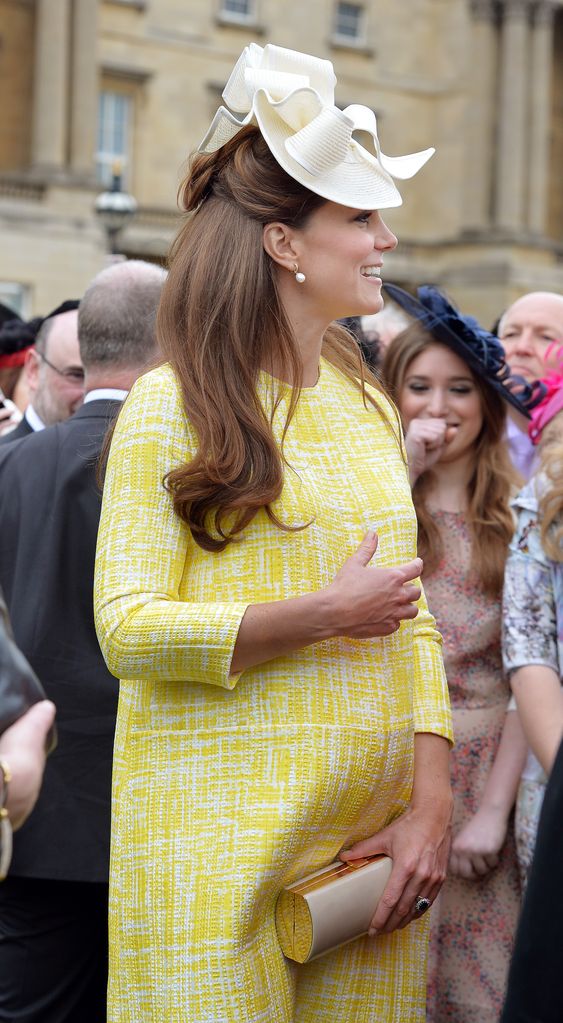 A photo of Princess Kate at a Garden Party hosted by Queen Elizabeth II at Buckingham Palace in 2013