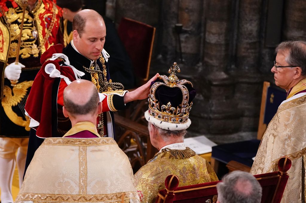 Prince William touching the St Edward's Crown during the King's Coronation Ceremony earlier this year