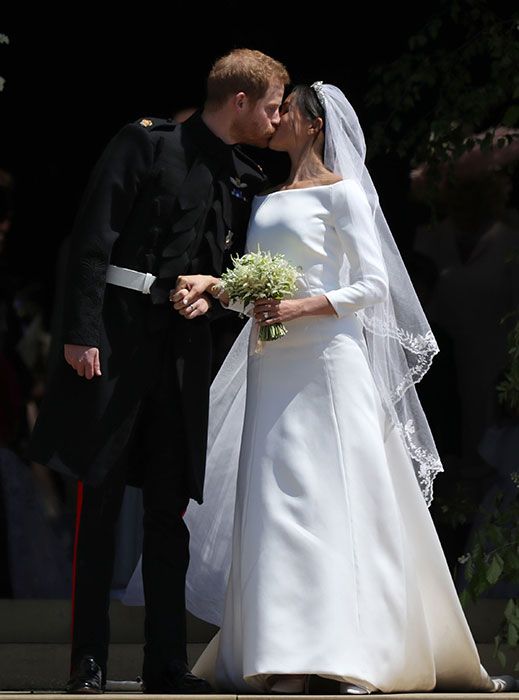 Prince Harry Meghan Markle kiss outside chapel