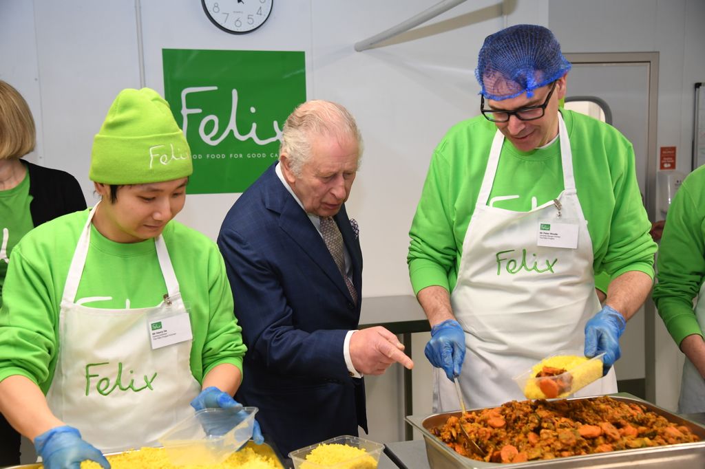 The Felix Project volunteers making hot meals with King Charles watches