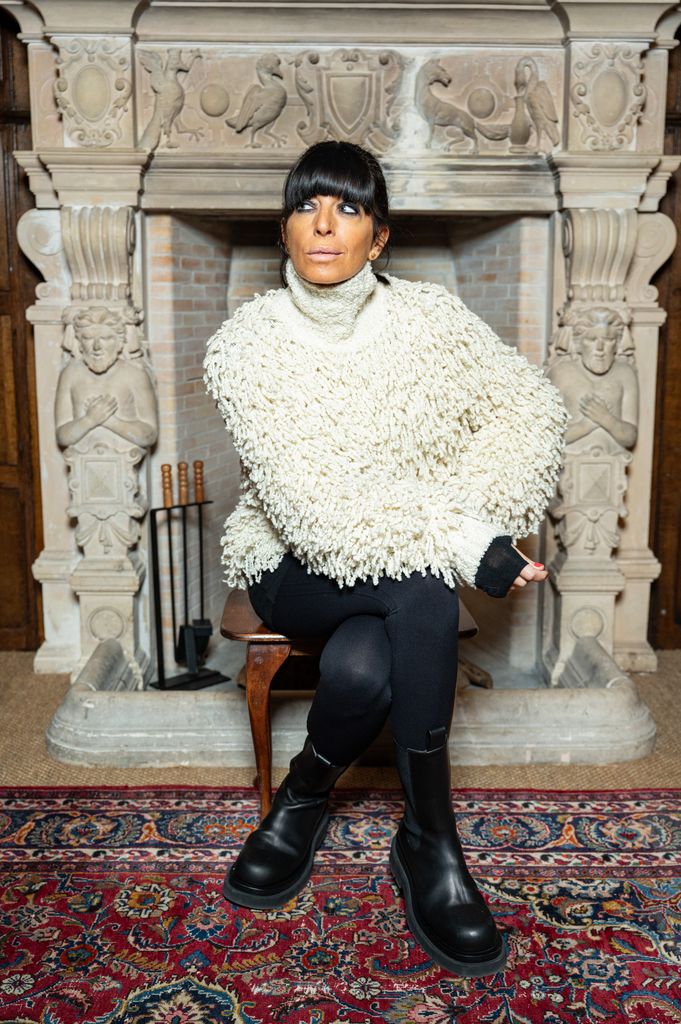 Claudia Winkleman shaggy cream coat on The Celebrity Traitors