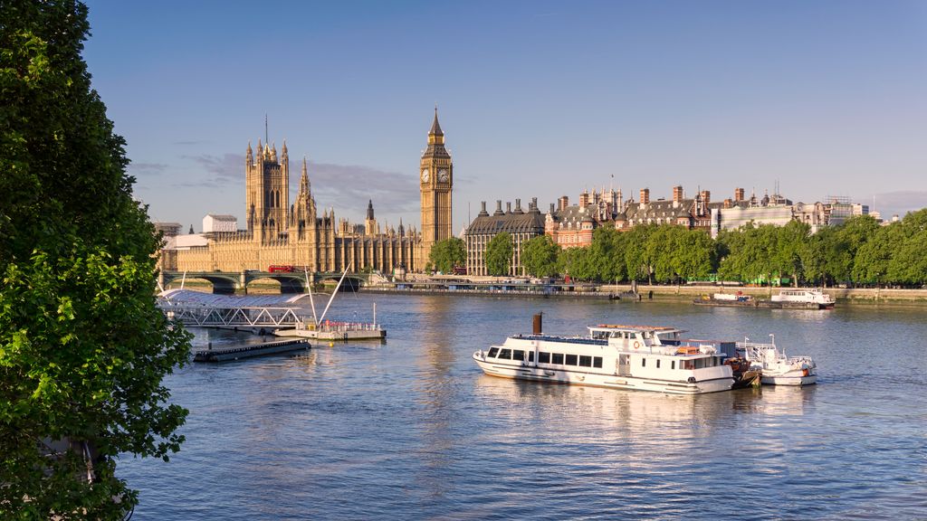 Across the river view of The Houses of Parliament and Big Ben on a sunny spring morning.