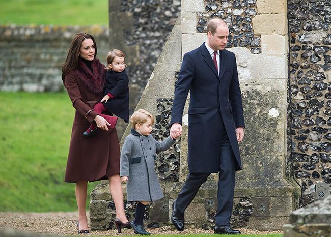 Prince William and Prince George walking with Princess Kate and Princess Charlotte
