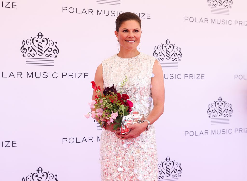 Crown Princess Victoria on red carpet in sparkly dress