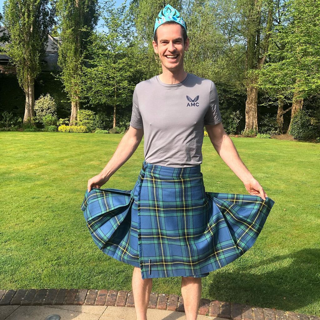 Andy wearing a kilt and a blue tiara 
