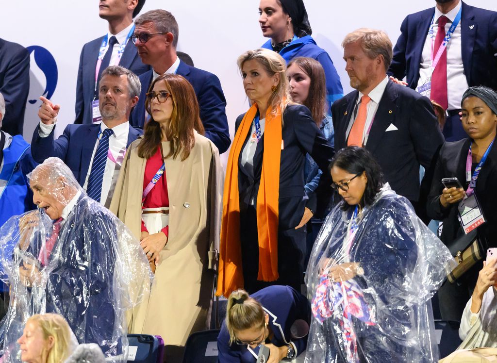 Queen Mary and king frederik alongside Queen Maxima and king willem-alexander in stands