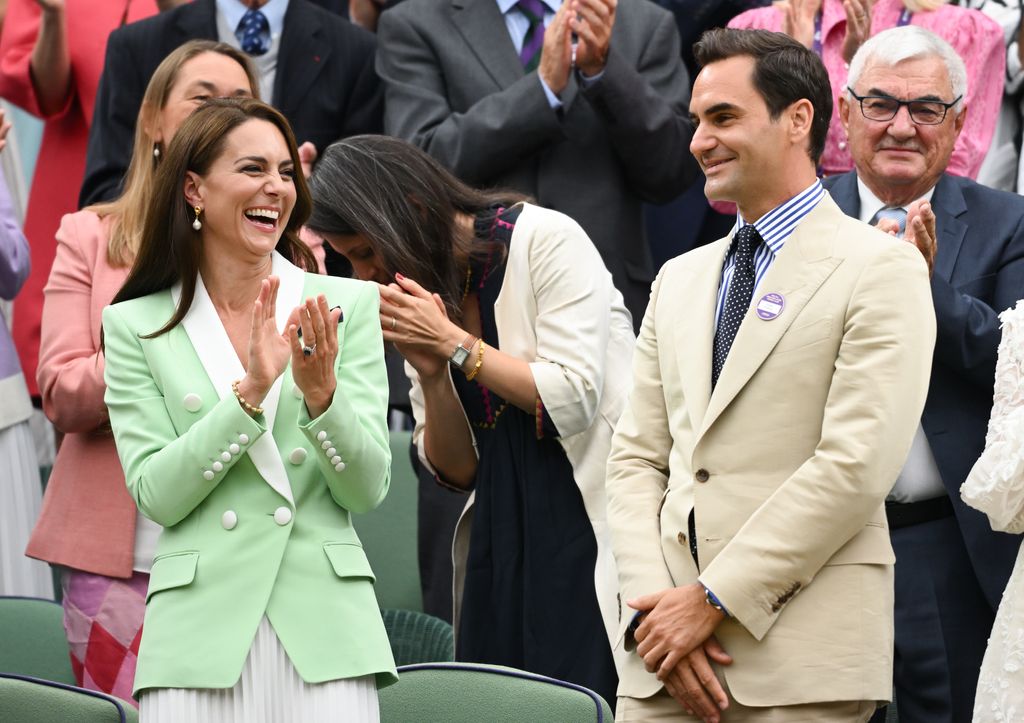 Princess of Wales and Roger Federer sit in the royal box at Wimbledon 2023