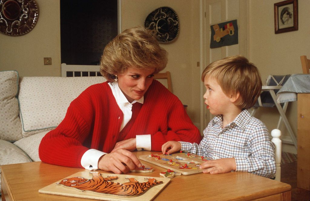 Princess Diana sat with a young Prince William