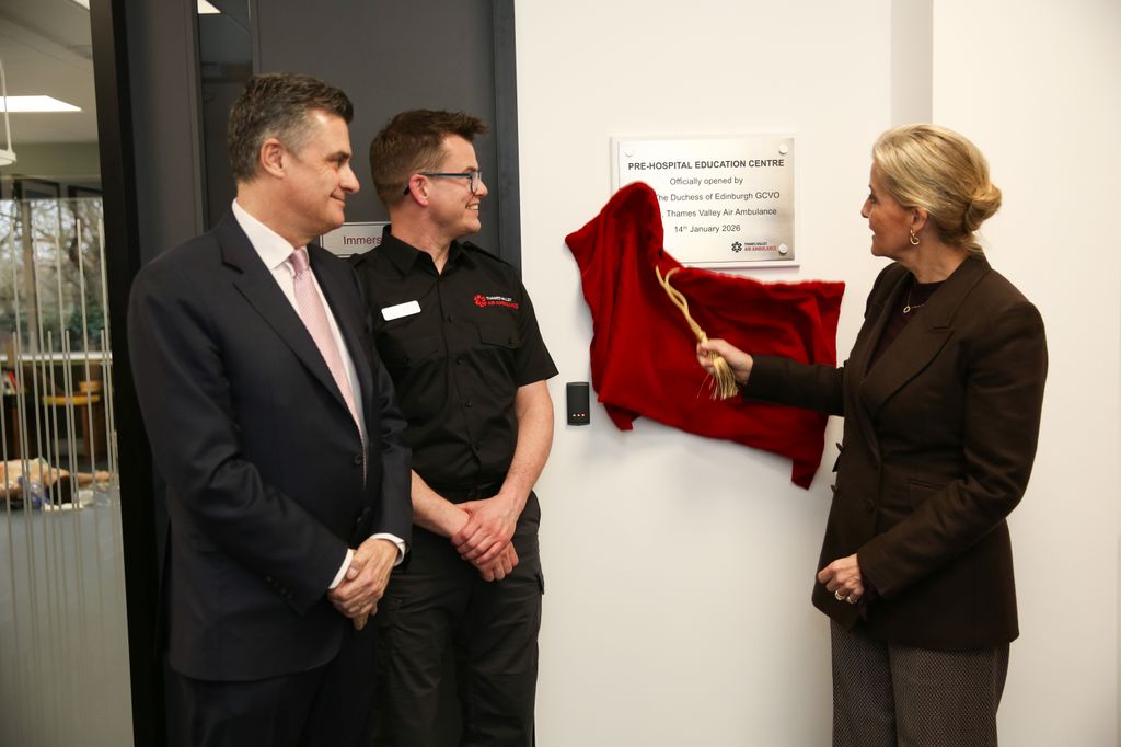 The Duchess unveils a commemorative plaque alongside Consultant Paramedic Mark Hodkinson and Chair of the Board of Trustees Chris Bannister