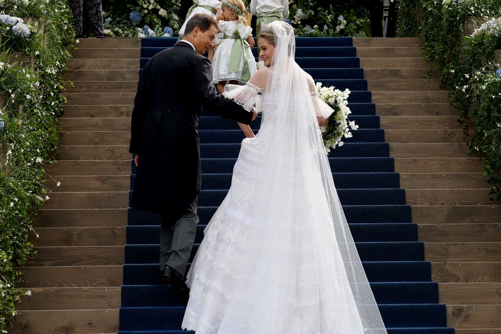 Alois, Hereditary Prince of Liechtenstein and Princess Marie Caroline Of Liechtenstein arrive at her wedding 