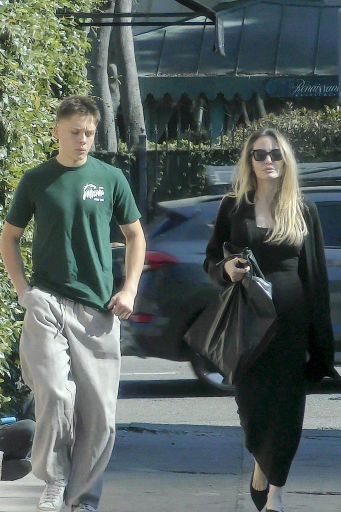 Knox walking with Angelina 