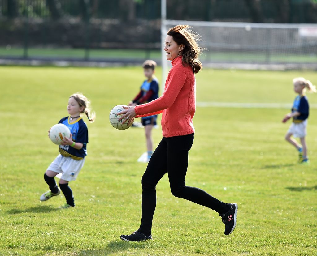 Princess Kate running with a ball