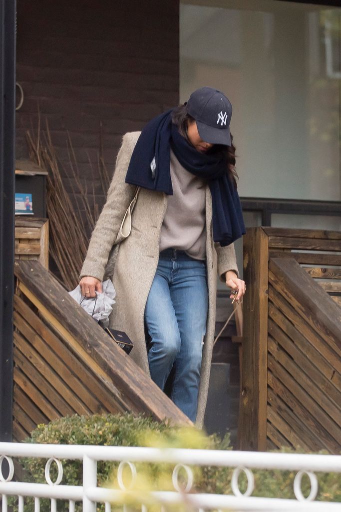 Meghan Markle walks down steps of former home in Toronto in 2017