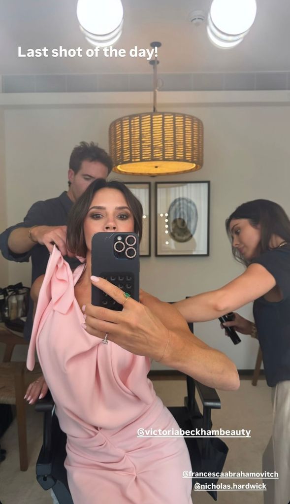 Victoria Beckham wearing a pink dress with diamond ring on Instagram Stories