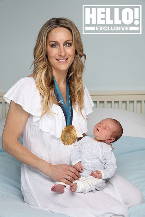 amy williams posing with son