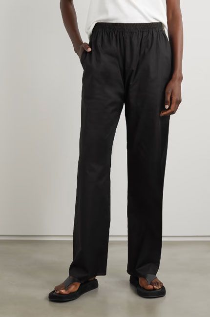 shopping image of black trousers by the row