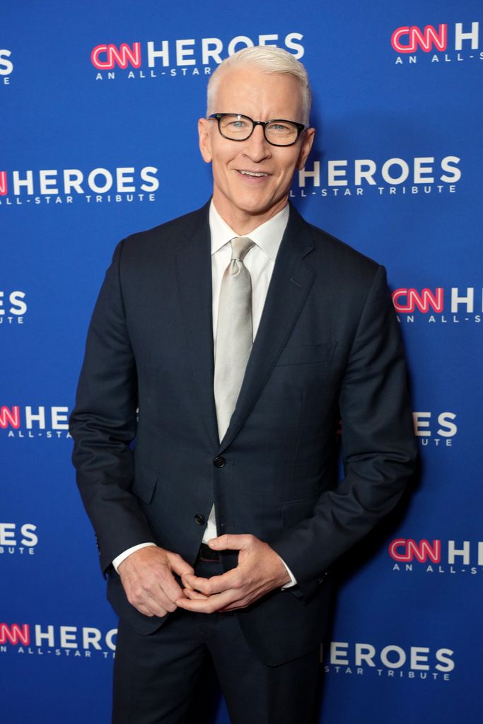 Anderson Cooper smiling at a red carpet event