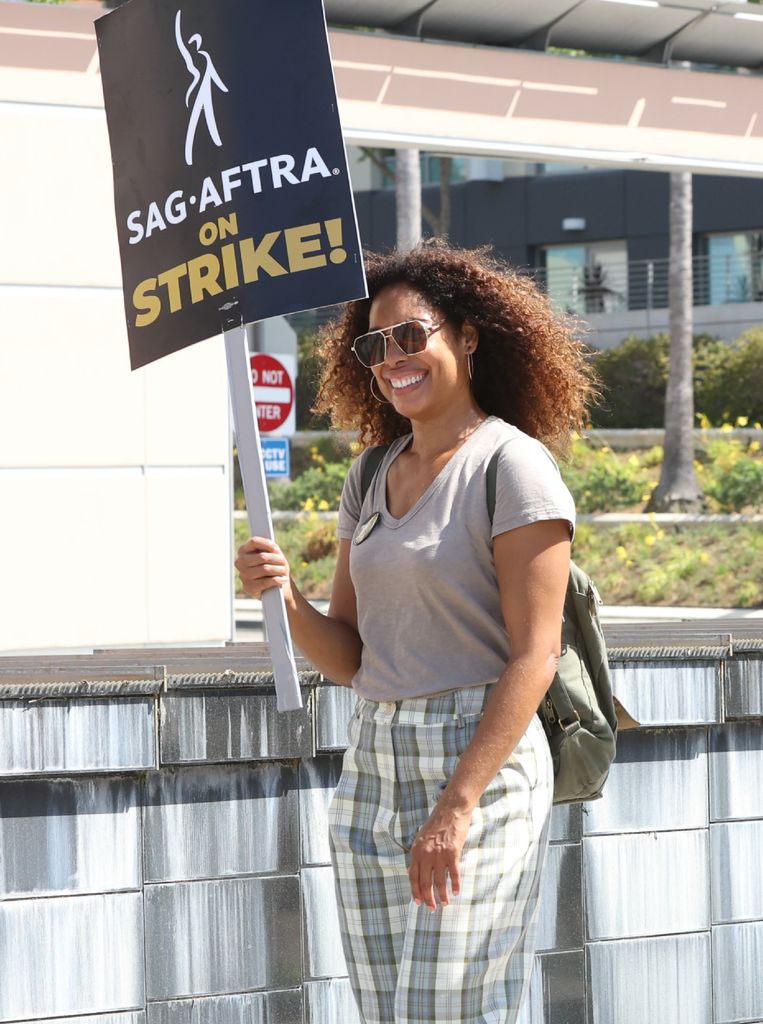 Gina is seen picketing with SAG-AFTRA and WGA members outside of Fox studios on July 24, 2023 in Los Angeles, California