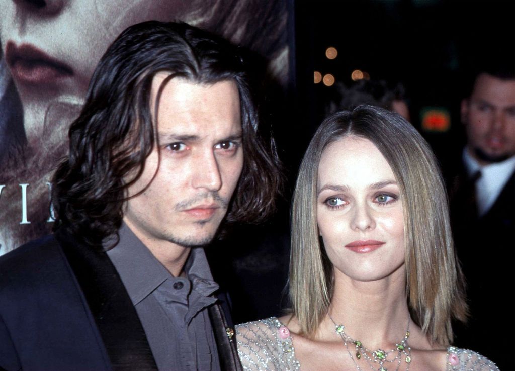 Johnny Depp and his girlfriend Vanessa Paradis arrive for the Los Angeles premiere of the movie "Sleepy Hollow" November 17, 1999. (Photo by Brenda Chase/Online USA/Newsmakers)