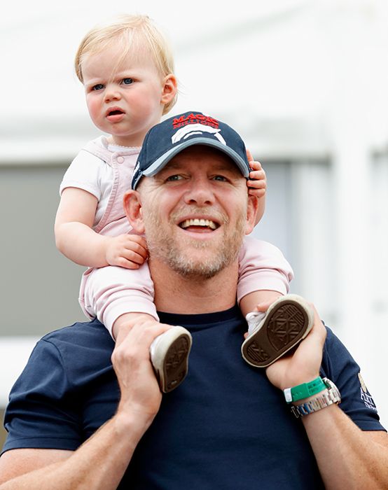 mike tindall carries daughter lena