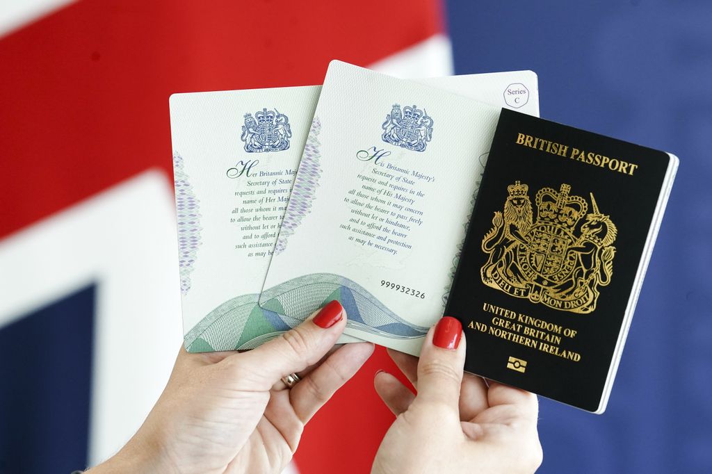 In 2023, passports were updated to include Charles in the intro, but they still feature Her Majesty's coat of arms