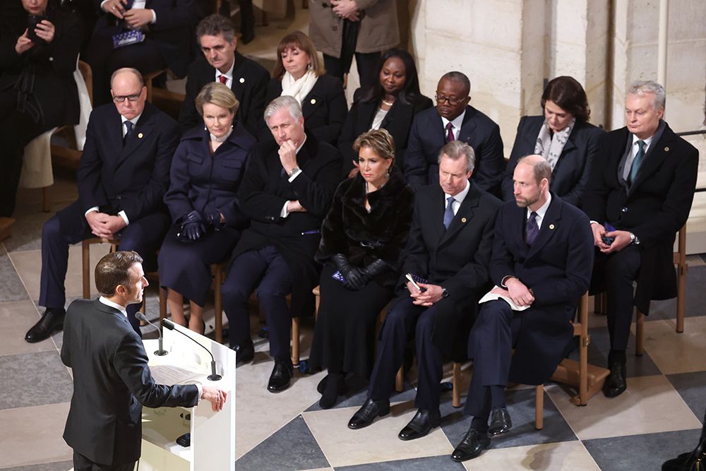 Prince Albert of Monaco sitting inside Notre Dame Cathedral