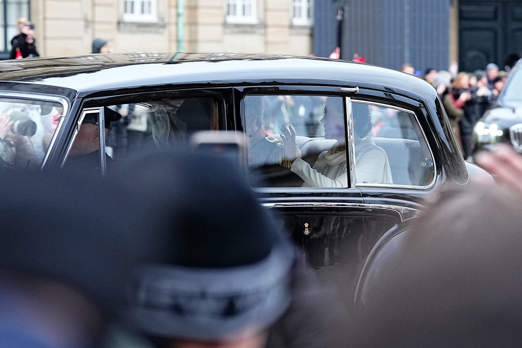 Crown Princess Mary waves from car