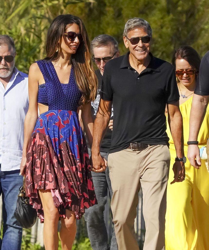 George Clooney and his wife Amal seen walking to La Cabane Bambou on Pampelonne Beach