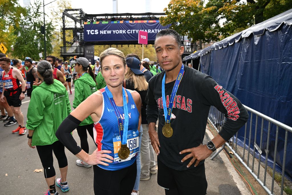 Amy Robach and TJ Holmes run during the 2022 TCS New York City Marathon on November 06, 2022 in New York City