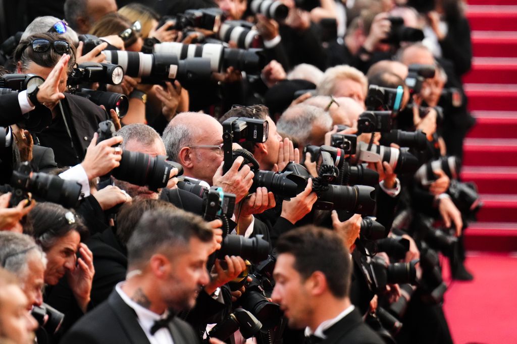 General view of photographers during the closing ceremony red carpet for the 75th annual Cannes film festival 