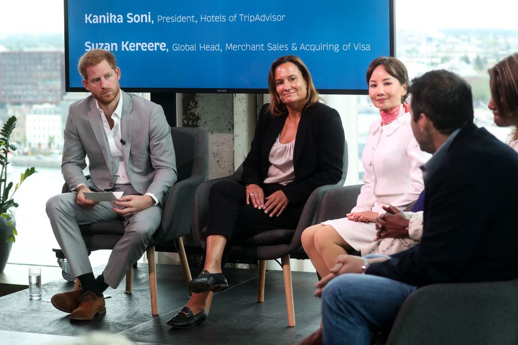 Prince Harry, Duke of Sussex speaks to Chairwoman of booking.com Gillian Tans, CEO Ctrip Jane Sun, President Hotels TripAdvisor Kanika Soni, Global Head of Merchand Sales and Acquiring VISA Suzan Kereere and CEO Skyscanner Bryan Dove as they announce a partnership between Booking.com, SkyScanner, CTrip, TripAdvisor and Visa called Travalyst