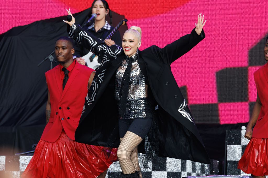 Gwen Stefani in fishnets and coat at British Summer Time 
