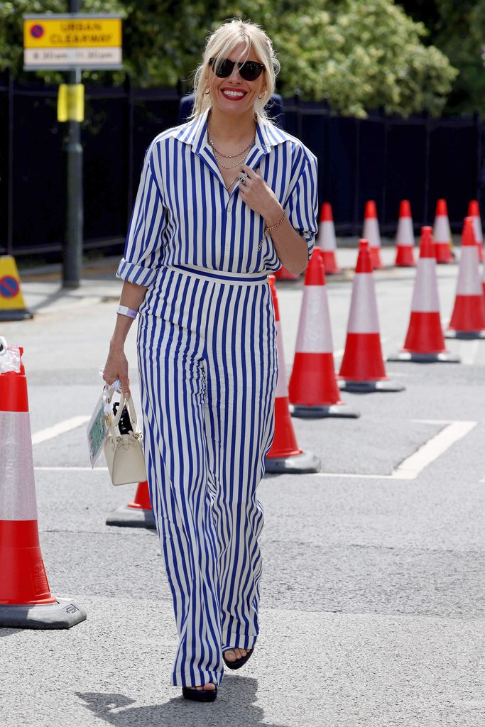 Sienna Miller  attends Wimbledon Championships Tennis Tournament Day 7 at All England Lawn Tennis and Croquet Club on July 05, 2021 in London, England. (Photo by Neil Mockford/GC Images)