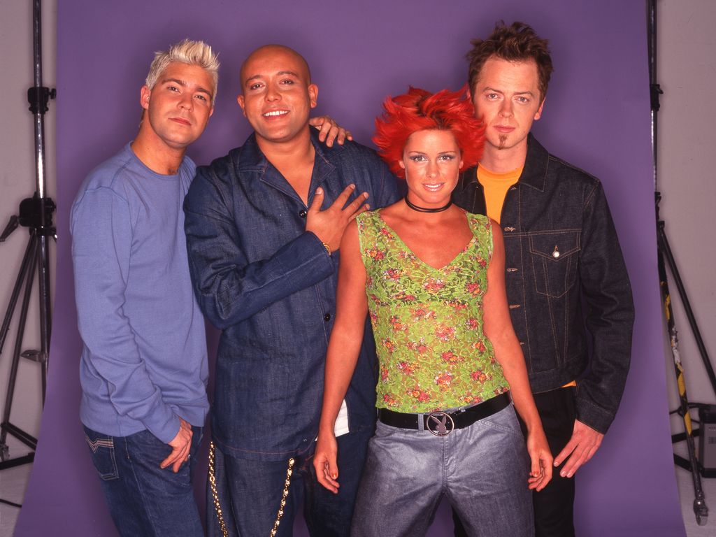Portrait of the members of Danish Pop group Aqua, early 2000s. Pictured are, from left, Soren Rasted, Rene Dif, Lene Nystrom, and Claus Norreen. (Photo by Tim Roney/Getty Images)