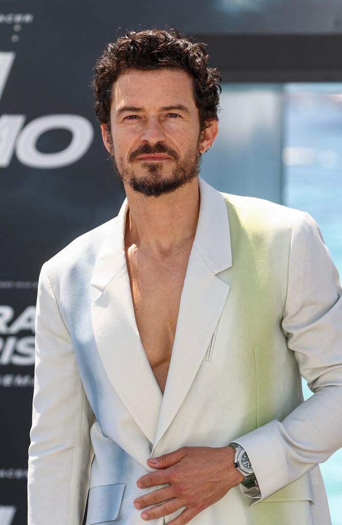 Orlando Bloom attends the "Gran Turismo" Photocall at the 76th annual Cannes film festival at Carlton Beach Club on May 26, 2023 in Cannes, France