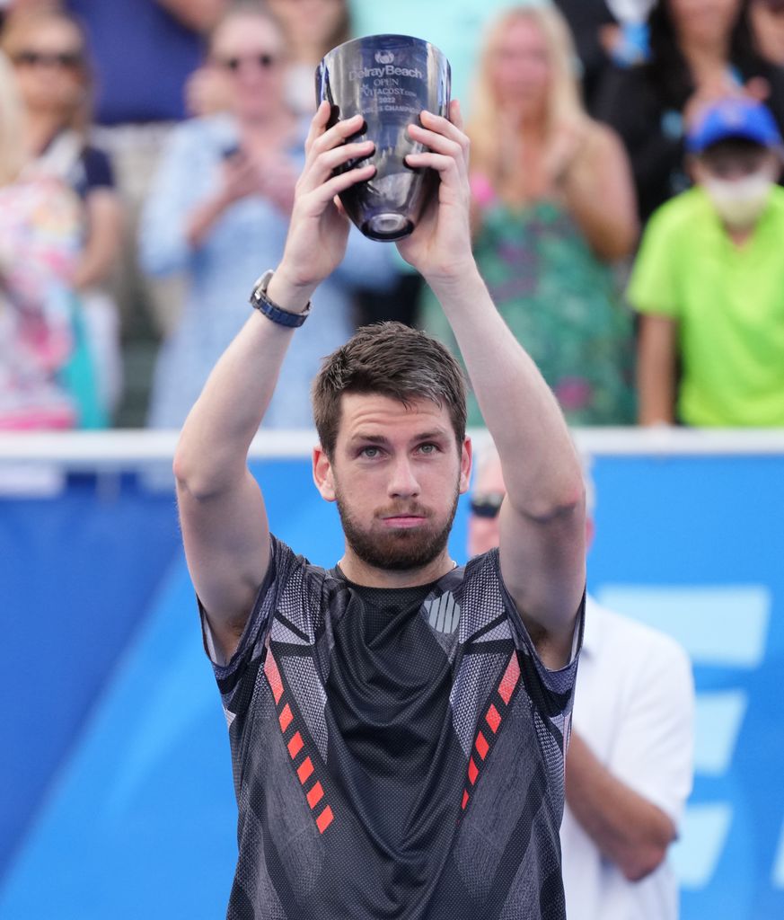 Cameron Norrie holding a trophy