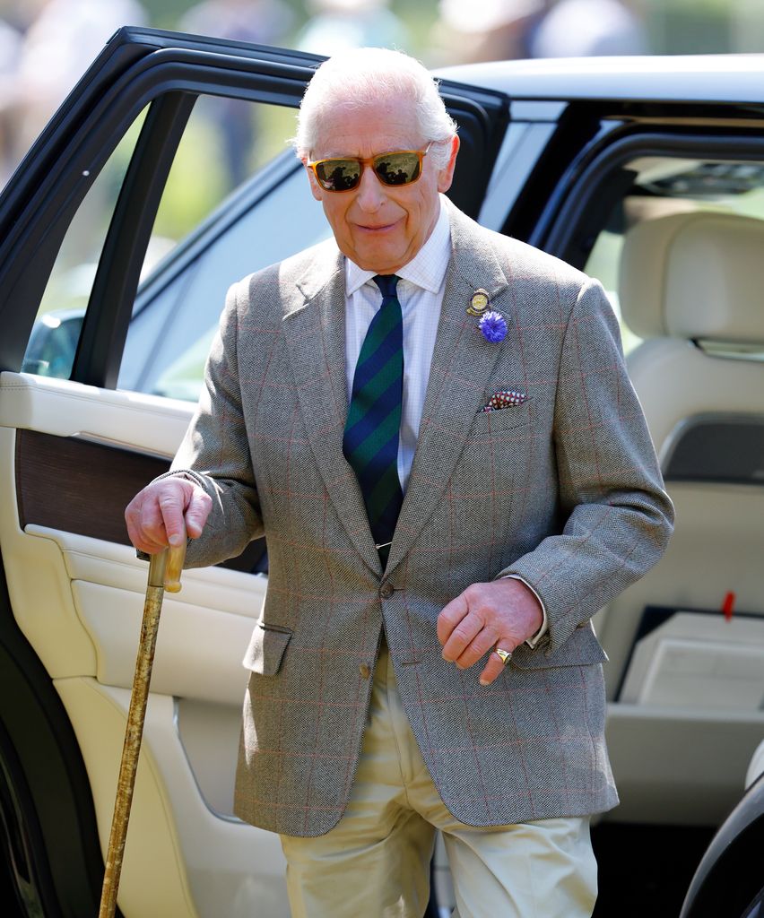 King Charles smiling in his 'cool' sunglasses on day 3 of the Royal Windsor Horse Show