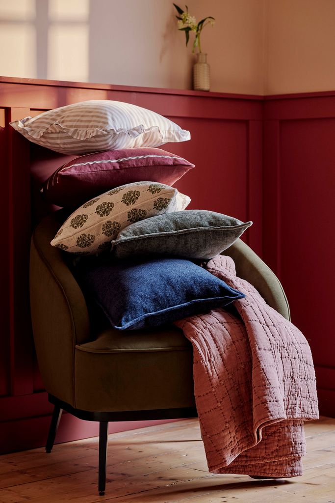 cushions and throws on chair