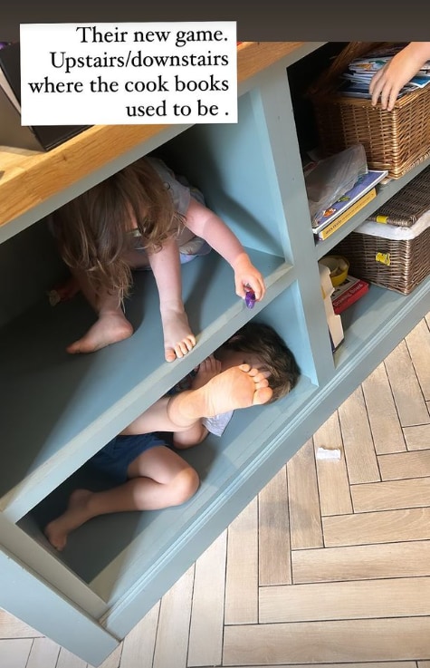 Alex Jones shared this photo of her two children hiding in the shelves