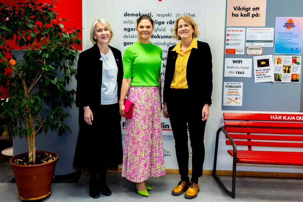 victoria in pink skirt and lime green top 
