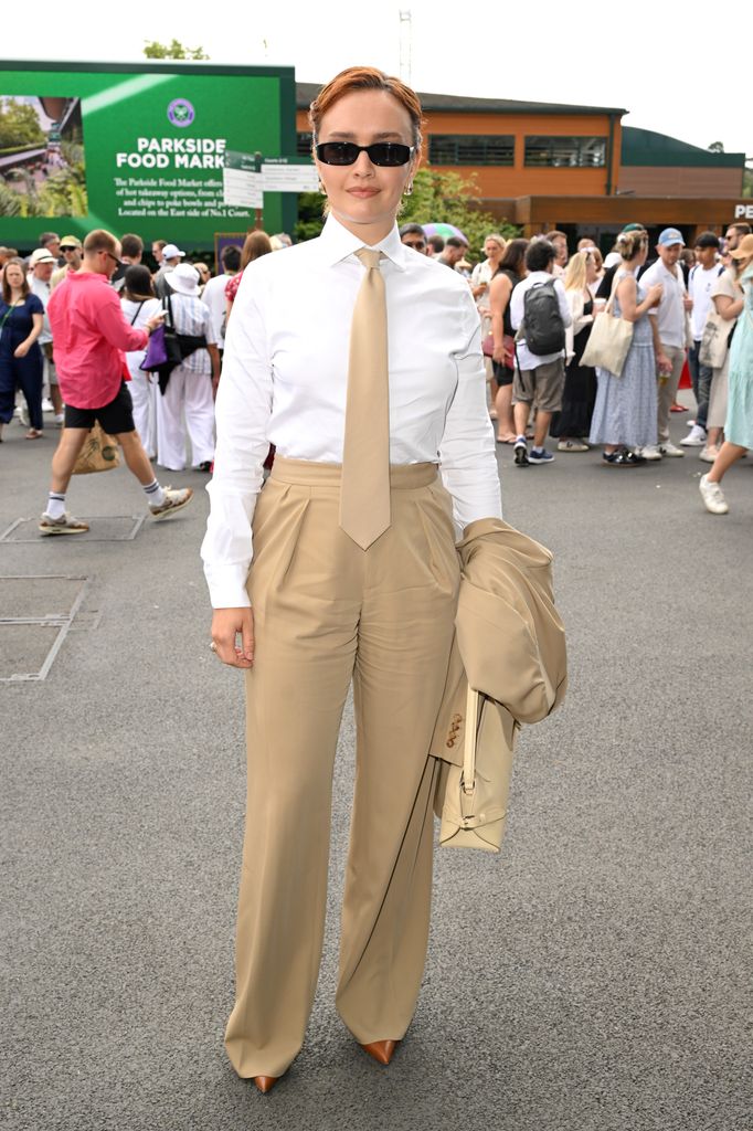 Olivia Cooke, wearing Ralph Lauren, attends day ten of the Wimbledon Tennis Championships at the All England Tennis and Croquet Club at on July 09, 2025 in London, England