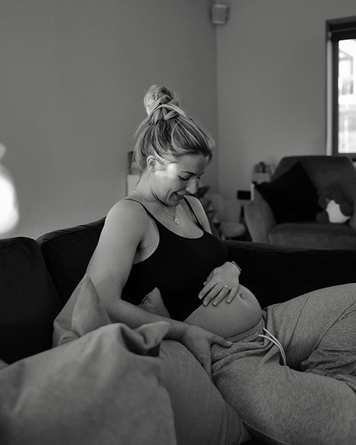 gemma atkinson shows off baby bump for pregnancy reveal in black and white photo at home
